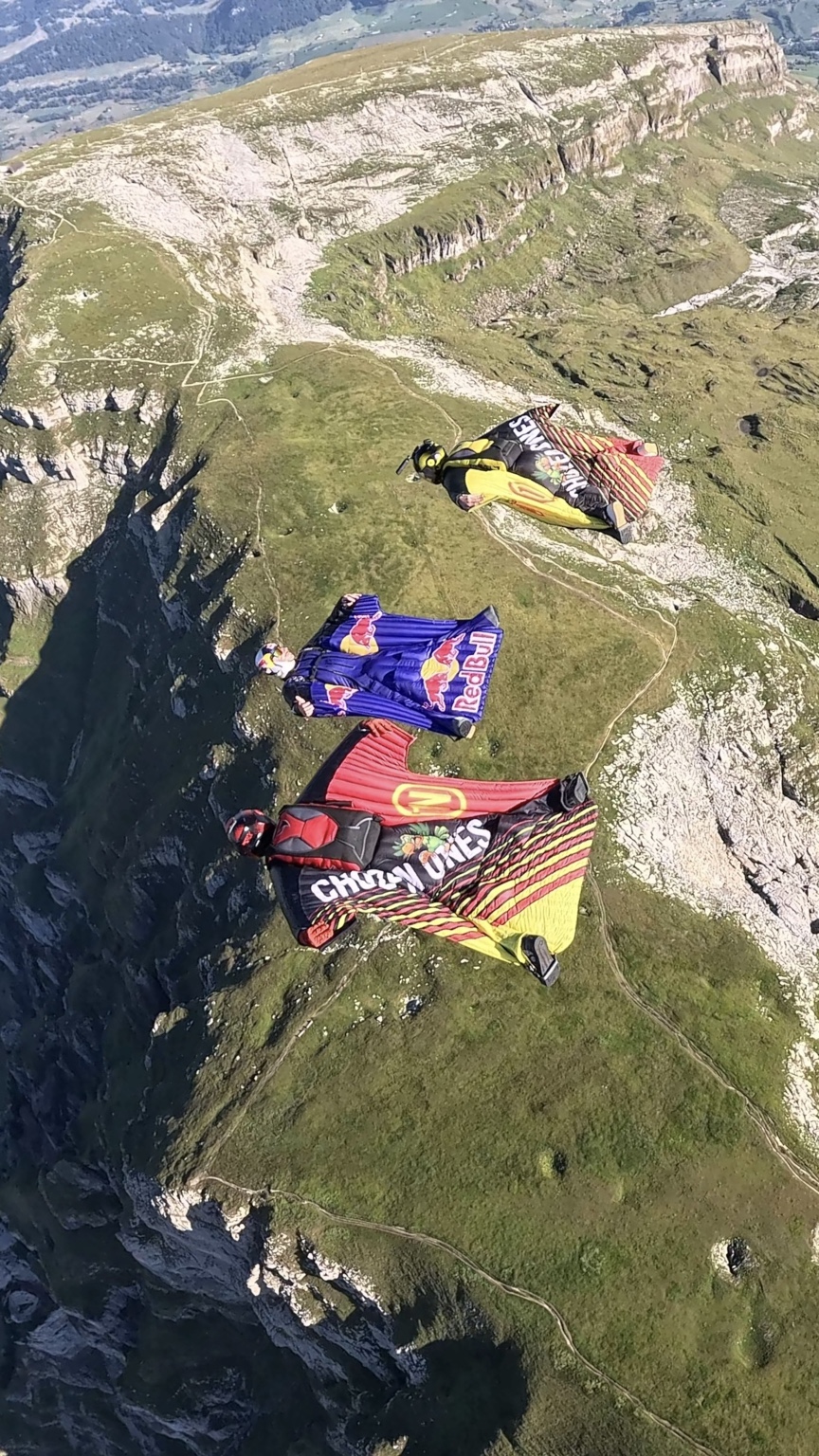 Chozen Ones and Red Bull wingsuit flyers above the Churfirsten