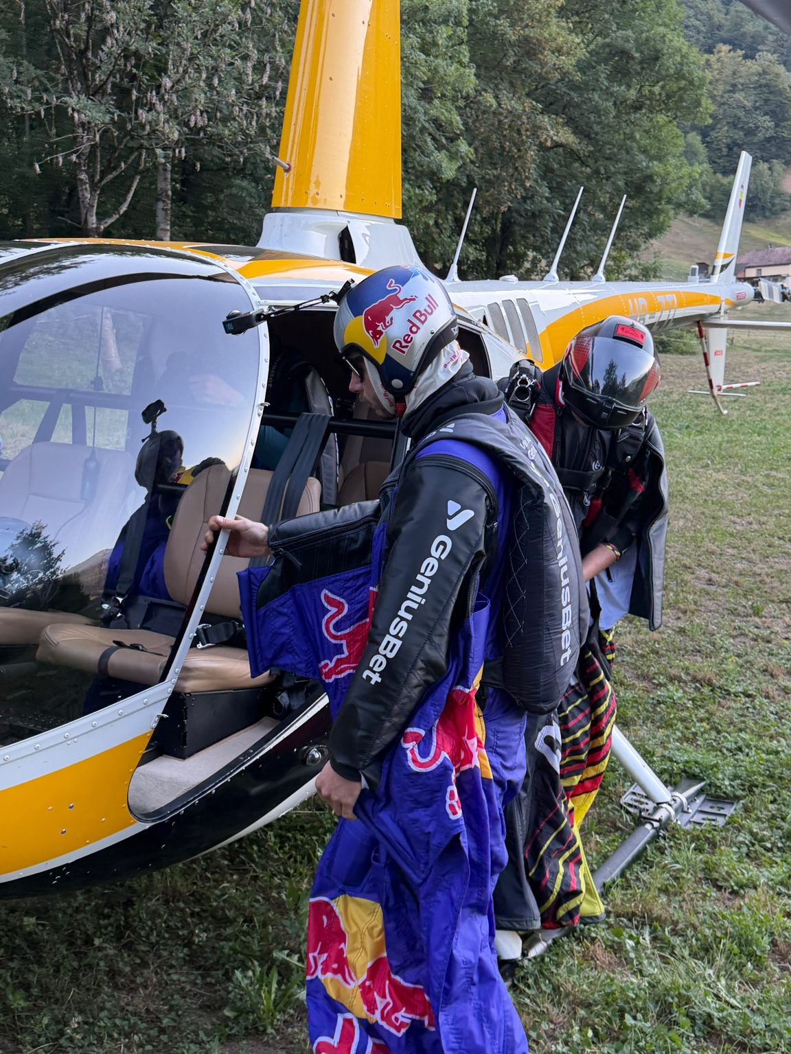 Wingsuit flyers boarding a helicopter in Walenstadt