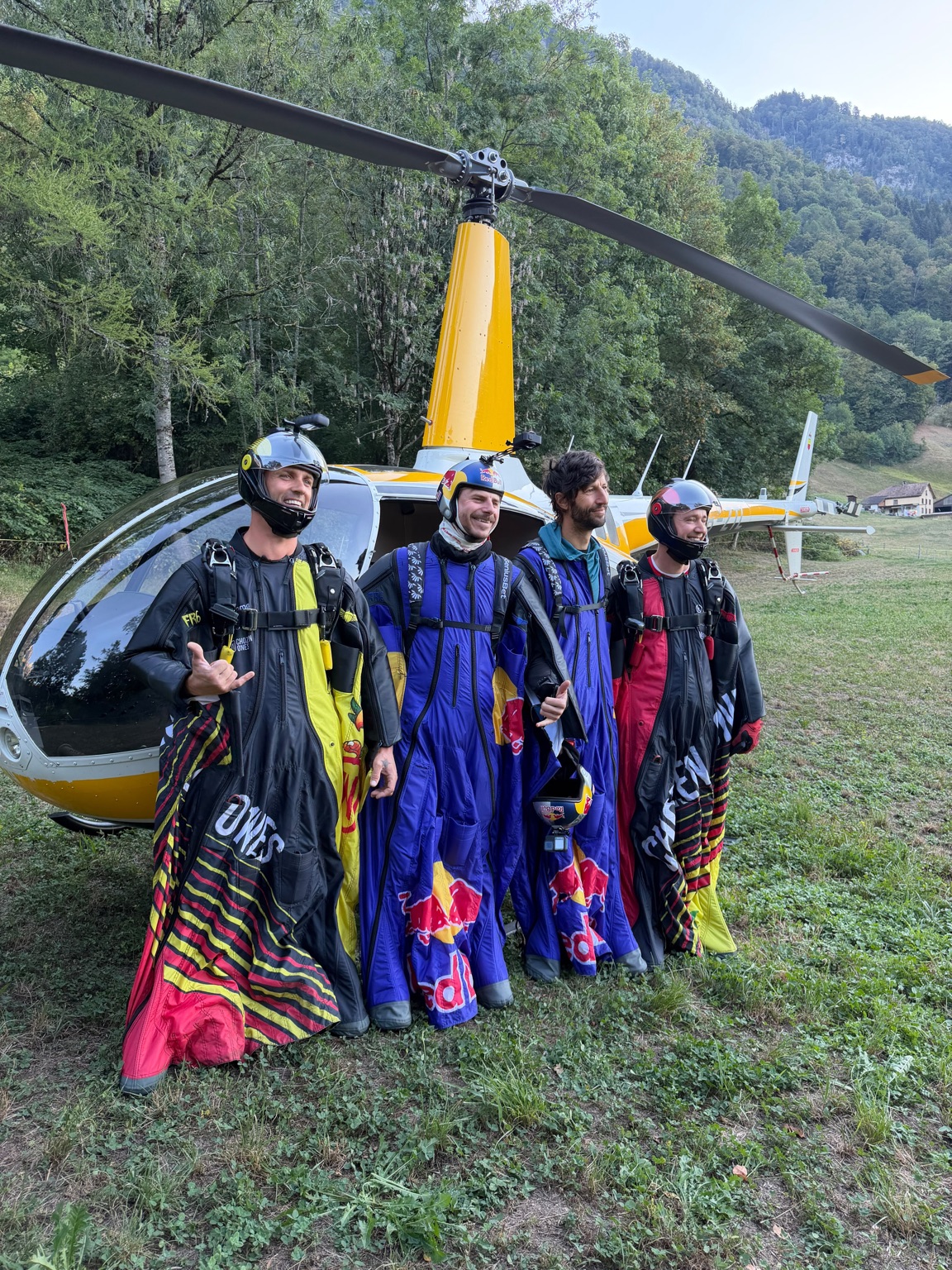 Chozen Ones and Red Bull flyers beside the helicopter
